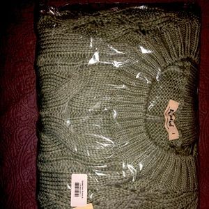 Three Bird Nest oversized cable sweater.